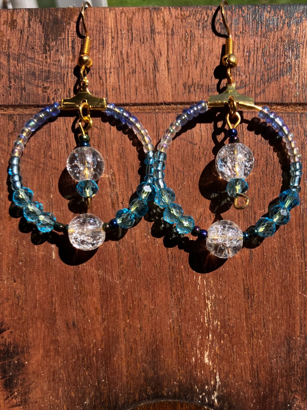 Blue beaded earrings with glass bead gold hardware